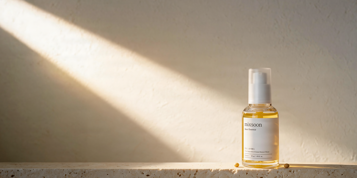 Mixsoon Bean Essence bottle in warm window light.