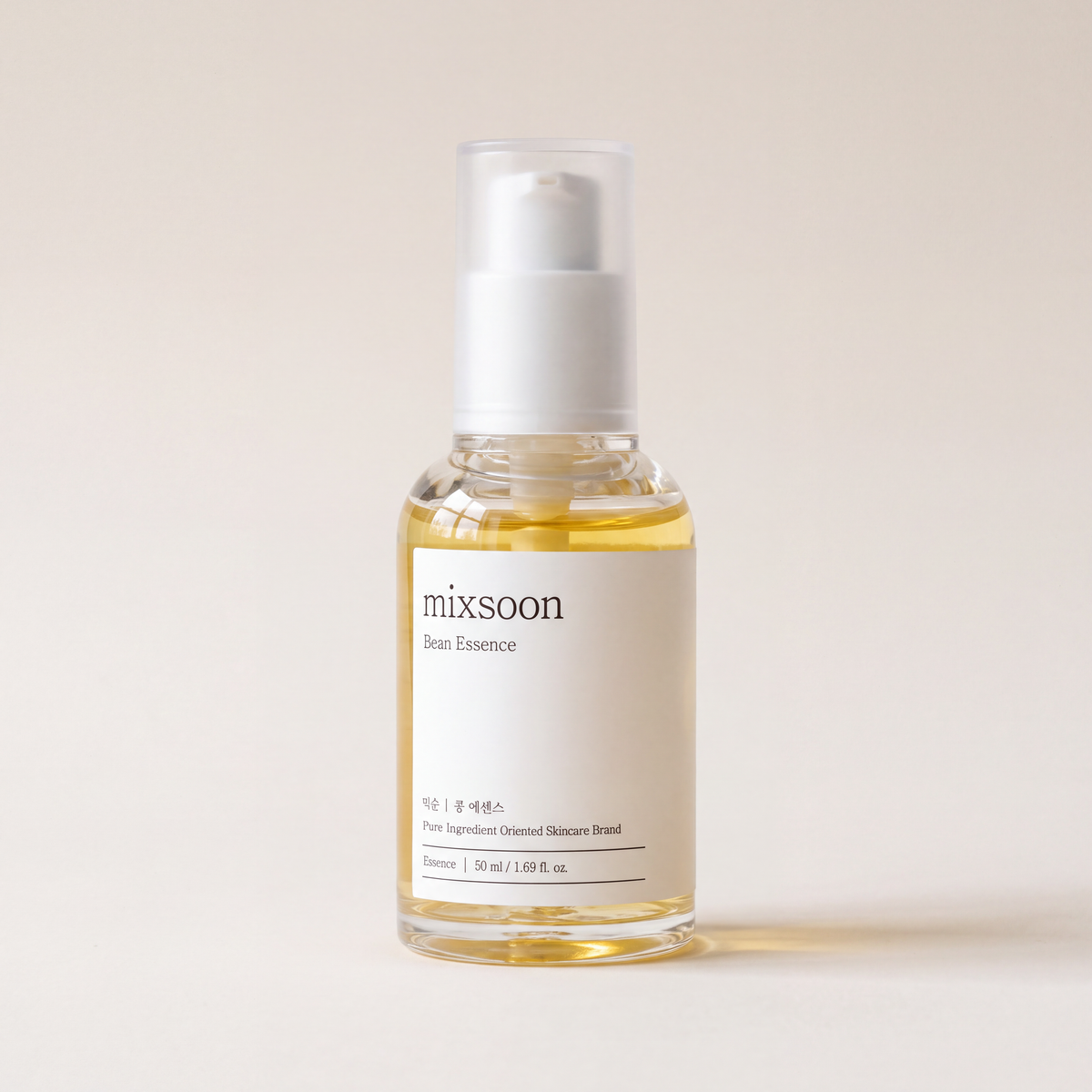 Mixsoon Bean Essence 50 ml bottle on a warm beige backdrop